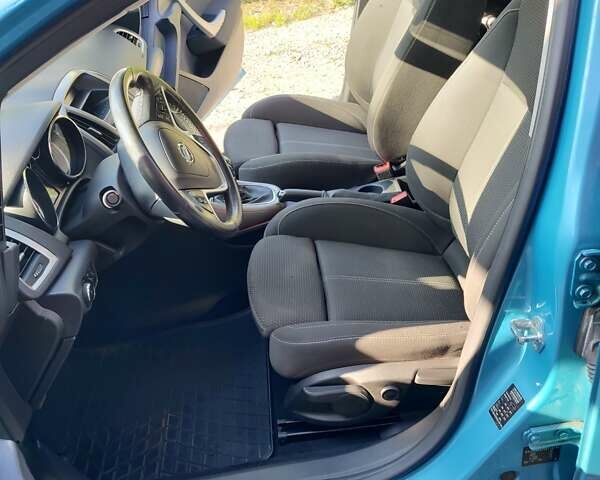 Синий Опель Астра, объемом двигателя 1.25 л и пробегом 225 тыс. км за 8700 $, фото 64 на Automoto.ua