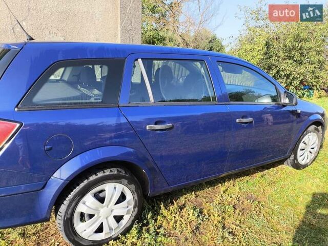Синий Опель Астра, объемом двигателя 1.7 л и пробегом 270 тыс. км за 6400 $, фото 7 на Automoto.ua