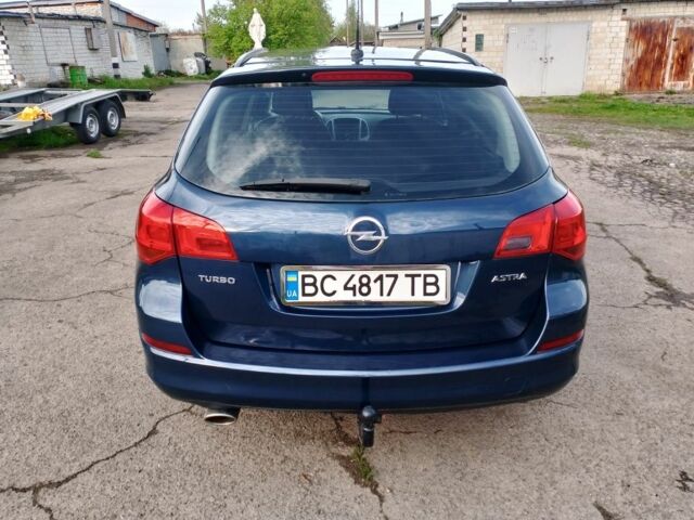 Синий Опель Астра, объемом двигателя 1.4 л и пробегом 260 тыс. км за 5800 $, фото 5 на Automoto.ua