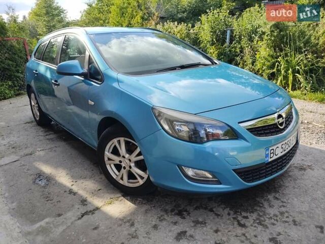 Синий Опель Астра, объемом двигателя 1.25 л и пробегом 225 тыс. км за 8700 $, фото 3 на Automoto.ua