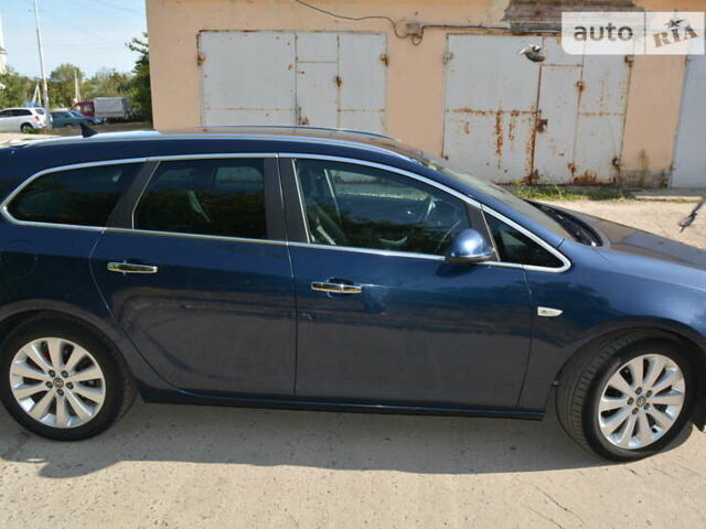 Синий Опель Астра, объемом двигателя 1.3 л и пробегом 215 тыс. км за 7300 $, фото 12 на Automoto.ua