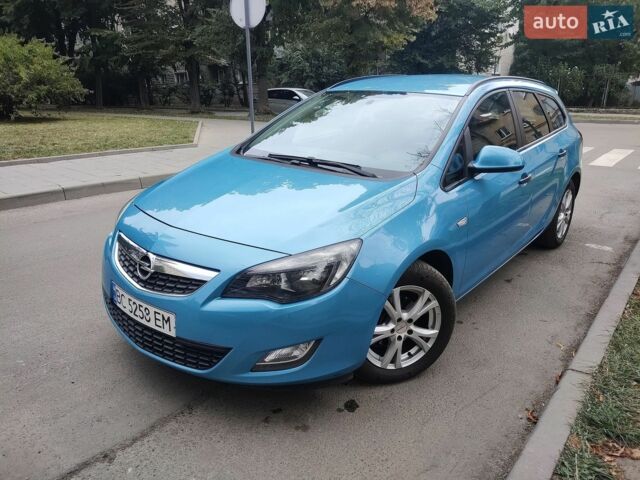 Синий Опель Астра, объемом двигателя 1.2 л и пробегом 227 тыс. км за 6450 $, фото 1 на Automoto.ua