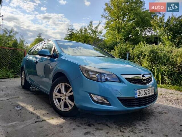 Синий Опель Астра, объемом двигателя 1.25 л и пробегом 225 тыс. км за 8700 $, фото 1 на Automoto.ua
