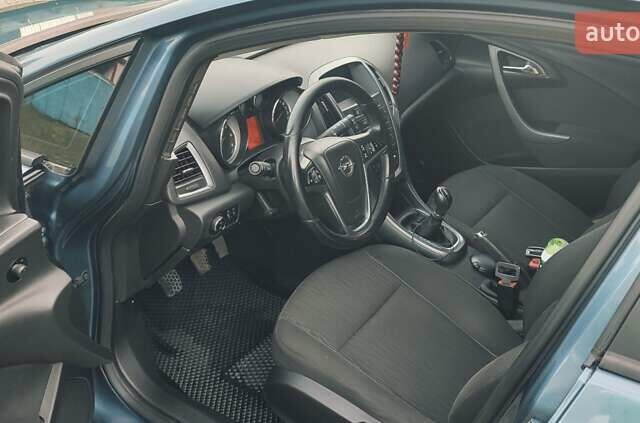 Синий Опель Астра, объемом двигателя 1.3 л и пробегом 265 тыс. км за 6000 $, фото 11 на Automoto.ua