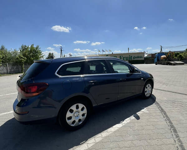 Синій Опель Астра, об'ємом двигуна 2 л та пробігом 240 тис. км за 8100 $, фото 4 на Automoto.ua