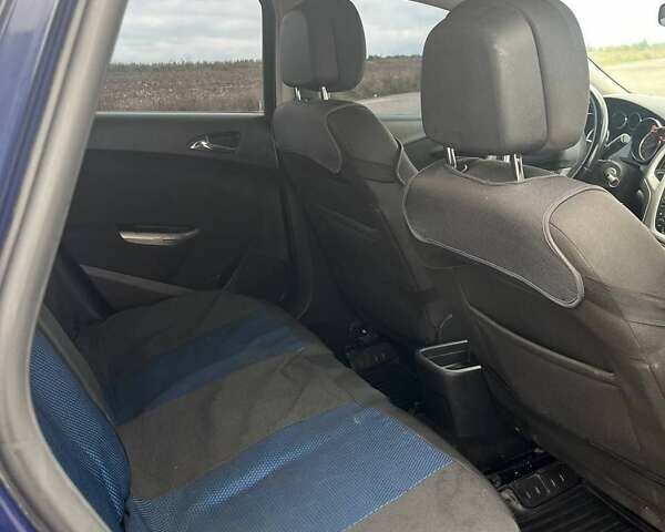 Синий Опель Астра, объемом двигателя 1.3 л и пробегом 246 тыс. км за 6500 $, фото 9 на Automoto.ua