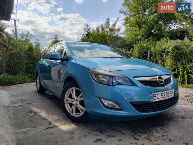 Синий Опель Астра, объемом двигателя 1.25 л и пробегом 225 тыс. км за 8700 $, фото 2 на Automoto.ua