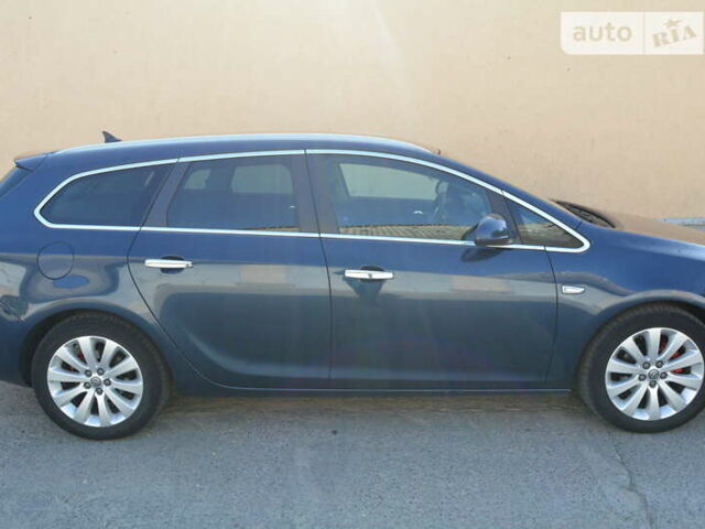 Синий Опель Астра, объемом двигателя 1.3 л и пробегом 215 тыс. км за 7300 $, фото 4 на Automoto.ua