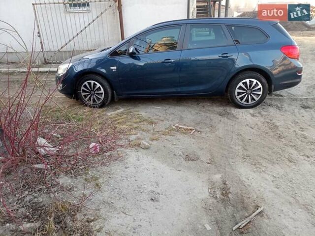 Синій Опель Астра, об'ємом двигуна 1.69 л та пробігом 216 тис. км за 7100 $, фото 6 на Automoto.ua