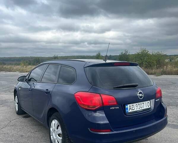 Синий Опель Астра, объемом двигателя 1.3 л и пробегом 246 тыс. км за 6500 $, фото 5 на Automoto.ua