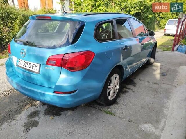 Синий Опель Астра, объемом двигателя 1.25 л и пробегом 225 тыс. км за 8700 $, фото 4 на Automoto.ua