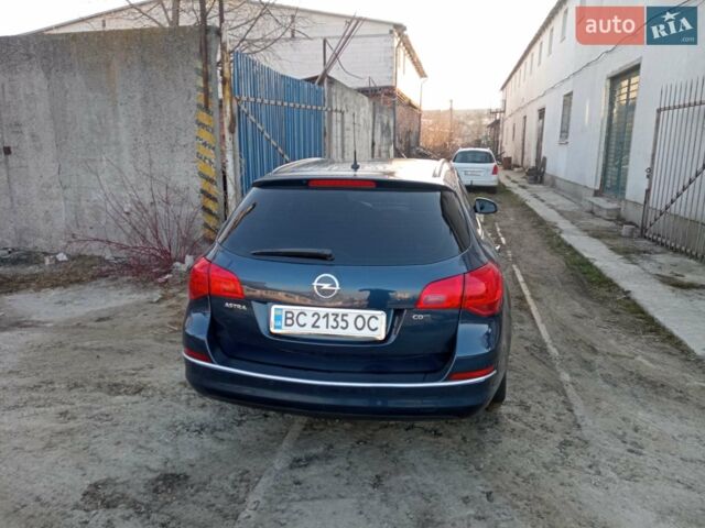 Синий Опель Астра, объемом двигателя 1.69 л и пробегом 216 тыс. км за 7000 $, фото 5 на Automoto.ua
