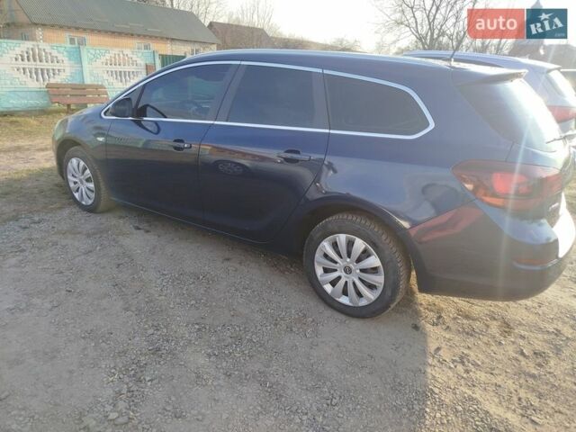 Синий Опель Астра, объемом двигателя 1.7 л и пробегом 330 тыс. км за 5999 $, фото 1 на Automoto.ua