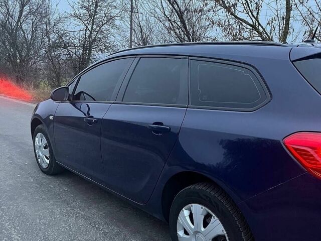 Синій Опель Астра, об'ємом двигуна 1.25 л та пробігом 254 тис. км за 5200 $, фото 3 на Automoto.ua