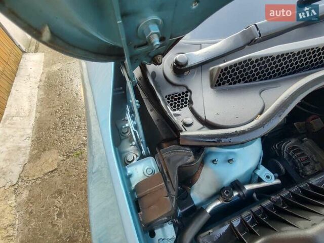 Синий Опель Астра, объемом двигателя 1.25 л и пробегом 225 тыс. км за 8700 $, фото 119 на Automoto.ua