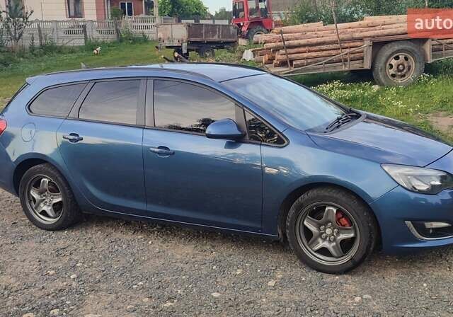 Синий Опель Астра, объемом двигателя 1.3 л и пробегом 265 тыс. км за 6000 $, фото 5 на Automoto.ua