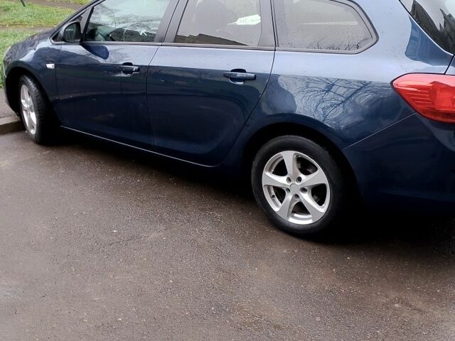 Синий Опель Астра, объемом двигателя 1.4 л и пробегом 290 тыс. км за 5900 $, фото 2 на Automoto.ua