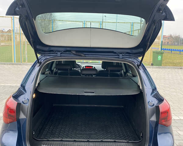 Синий Опель Астра, объемом двигателя 2 л и пробегом 258 тыс. км за 7500 $, фото 12 на Automoto.ua