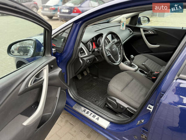 Синий Опель Астра, объемом двигателя 1.7 л и пробегом 230 тыс. км за 7999 $, фото 14 на Automoto.ua