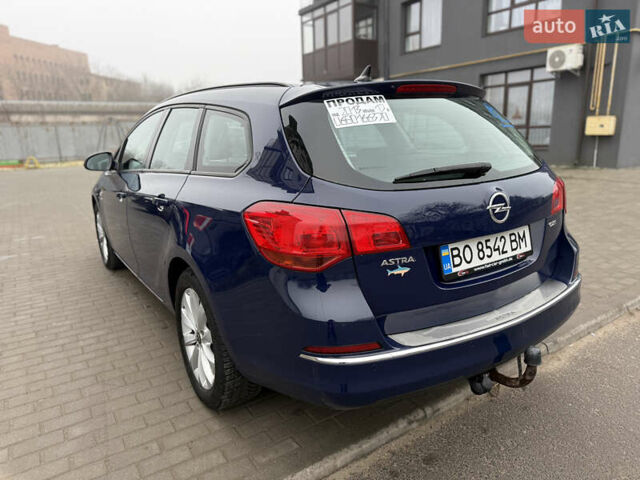 Синий Опель Астра, объемом двигателя 1.7 л и пробегом 230 тыс. км за 7999 $, фото 6 на Automoto.ua