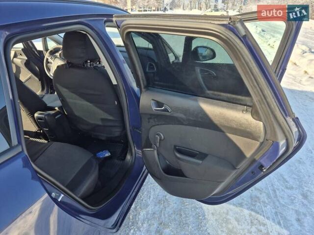 Синій Опель Астра, об'ємом двигуна 1.3 л та пробігом 184 тис. км за 9000 $, фото 25 на Automoto.ua