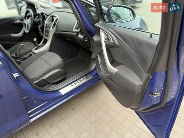 Синий Опель Астра, объемом двигателя 1.7 л и пробегом 230 тыс. км за 7999 $, фото 24 на Automoto.ua