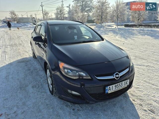 Синій Опель Астра, об'ємом двигуна 1.3 л та пробігом 184 тис. км за 9000 $, фото 4 на Automoto.ua