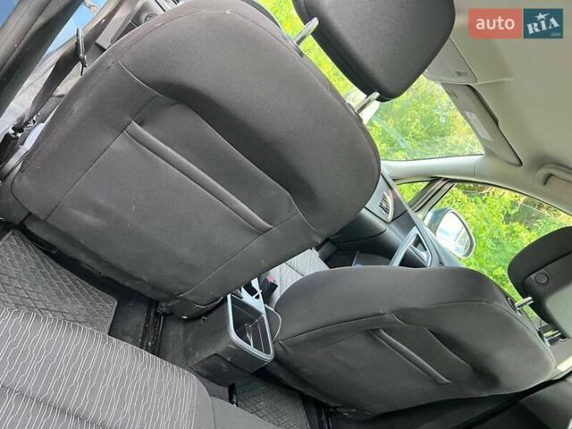 Синий Опель Астра, объемом двигателя 1.7 л и пробегом 247 тыс. км за 7200 $, фото 24 на Automoto.ua