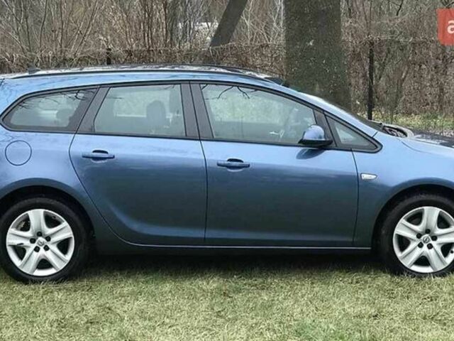 Синий Опель Астра, объемом двигателя 1.7 л и пробегом 289 тыс. км за 7399 $, фото 5 на Automoto.ua