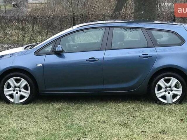 Синий Опель Астра, объемом двигателя 1.7 л и пробегом 289 тыс. км за 7399 $, фото 3 на Automoto.ua