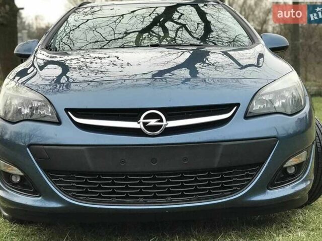 Синий Опель Астра, объемом двигателя 1.7 л и пробегом 289 тыс. км за 7399 $, фото 4 на Automoto.ua