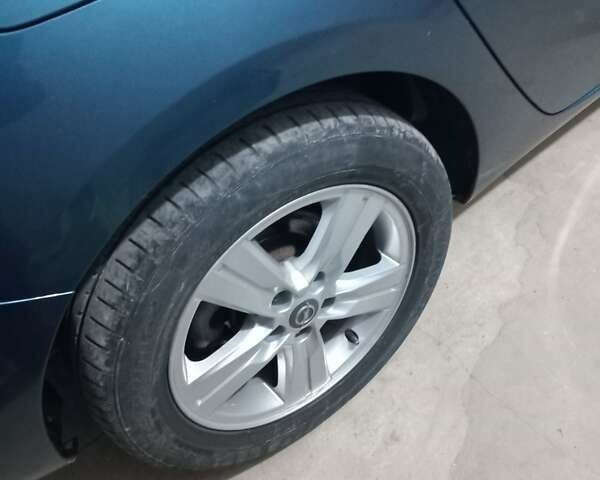 Синий Опель Астра, объемом двигателя 1.6 л и пробегом 287 тыс. км за 9600 $, фото 5 на Automoto.ua