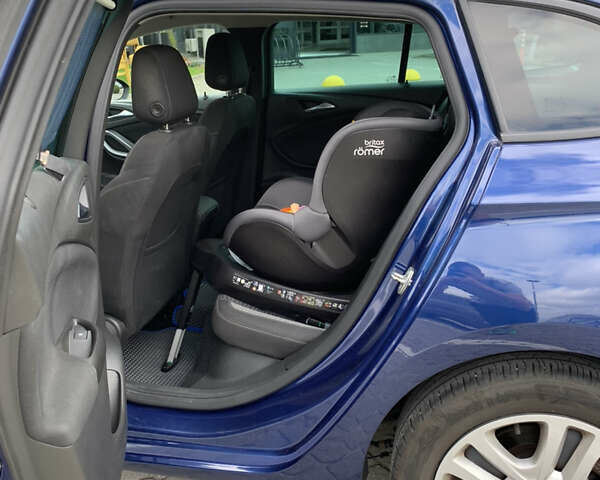 Синий Опель Астра, объемом двигателя 1.5 л и пробегом 150 тыс. км за 14500 $, фото 6 на Automoto.ua