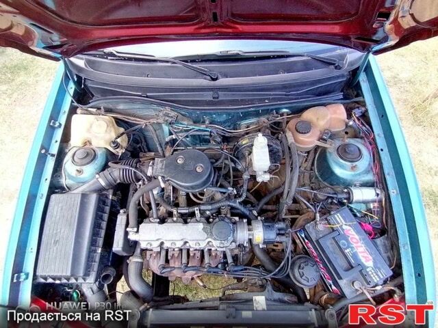 Зеленый Опель Астра, объемом двигателя 1.4 л и пробегом 400 тыс. км за 670 $, фото 6 на Automoto.ua