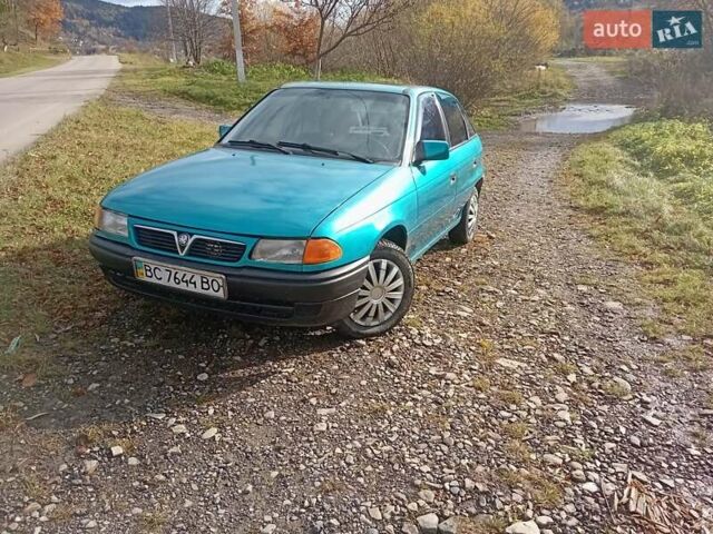 Зеленый Опель Астра, объемом двигателя 1.6 л и пробегом 258 тыс. км за 1393 $, фото 6 на Automoto.ua