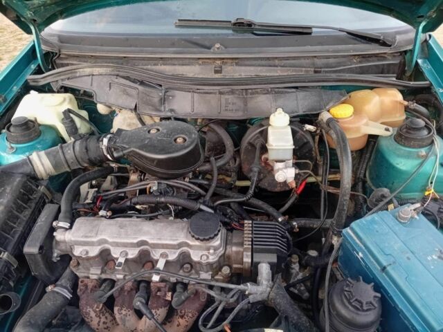 Зеленый Опель Астра, объемом двигателя 1.6 л и пробегом 253 тыс. км за 1277 $, фото 7 на Automoto.ua