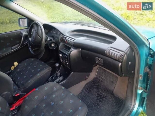 Зеленый Опель Астра, объемом двигателя 1.6 л и пробегом 253 тыс. км за 1299 $, фото 8 на Automoto.ua