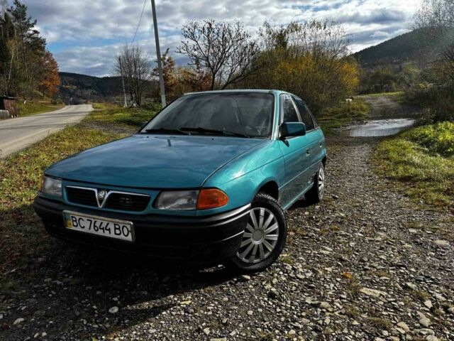 Зеленый Опель Астра, объемом двигателя 1.6 л и пробегом 253 тыс. км за 1277 $, фото 2 на Automoto.ua