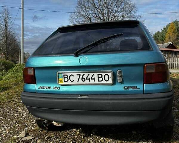 Зеленый Опель Астра, объемом двигателя 1.6 л и пробегом 258 тыс. км за 1393 $, фото 3 на Automoto.ua