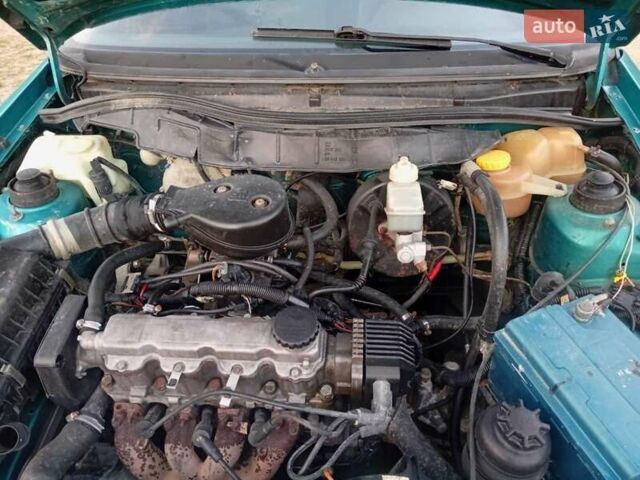 Зеленый Опель Астра, объемом двигателя 1.6 л и пробегом 258 тыс. км за 1393 $, фото 24 на Automoto.ua