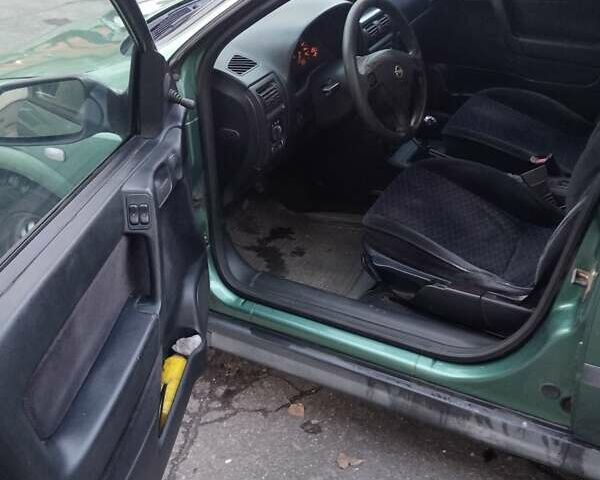 Зелений Опель Астра, об'ємом двигуна 1.39 л та пробігом 411 тис. км за 1750 $, фото 11 на Automoto.ua