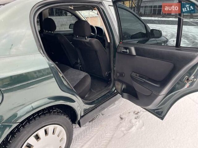 Зелений Опель Астра, об'ємом двигуна 1.4 л та пробігом 325 тис. км за 2350 $, фото 8 на Automoto.ua