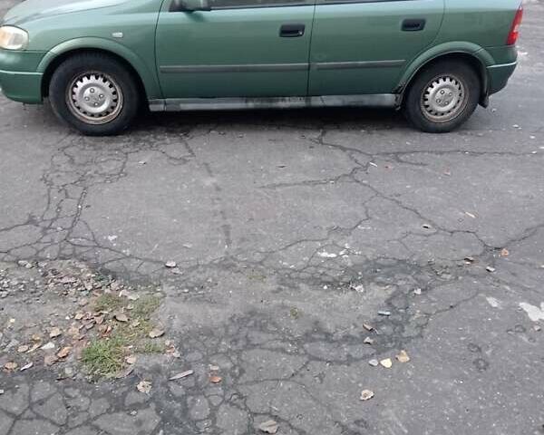 Зелений Опель Астра, об'ємом двигуна 1.39 л та пробігом 411 тис. км за 1750 $, фото 3 на Automoto.ua