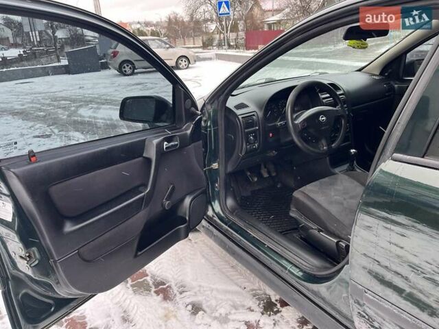 Зелений Опель Астра, об'ємом двигуна 1.4 л та пробігом 325 тис. км за 2350 $, фото 4 на Automoto.ua