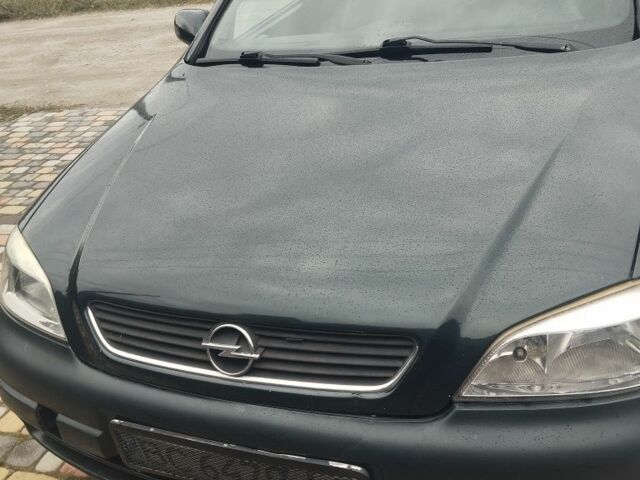 Зелений Опель Астра, об'ємом двигуна 1.4 л та пробігом 6 тис. км за 2063 $, фото 4 на Automoto.ua