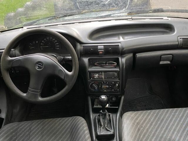 Зеленый Опель Астра, объемом двигателя 1.4 л и пробегом 342 тыс. км за 642 $, фото 6 на Automoto.ua