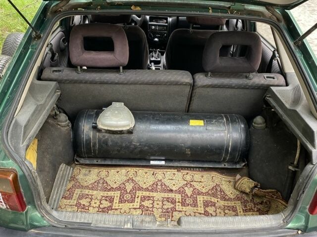 Зеленый Опель Астра, объемом двигателя 1.4 л и пробегом 342 тыс. км за 642 $, фото 7 на Automoto.ua