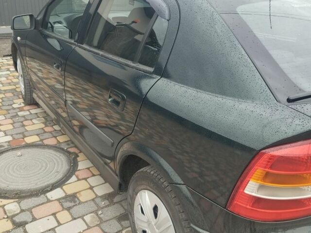 Зелений Опель Астра, об'ємом двигуна 1.4 л та пробігом 6 тис. км за 2063 $, фото 5 на Automoto.ua