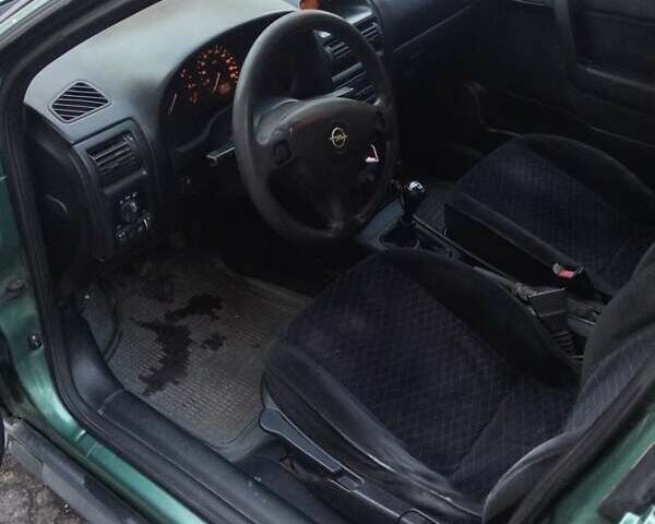 Зелений Опель Астра, об'ємом двигуна 1.39 л та пробігом 411 тис. км за 1750 $, фото 10 на Automoto.ua