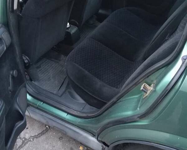 Зелений Опель Астра, об'ємом двигуна 1.39 л та пробігом 411 тис. км за 1750 $, фото 8 на Automoto.ua